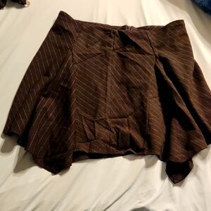 Pinstriped Mini Skirt With An Asymmetrical Hem Detail And Zip Close. NWT
